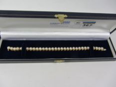 Gold pearl hinged link bracelet hallmarked 14ct Condition Report <a href='//www.