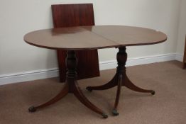 20th century mahogany Regency style twin pedestal dining table with leaf,
