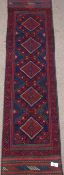 Meshwani red and blue ground runner rug,