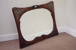 Mahogany framed mirror fitted with embossed metal mounts,