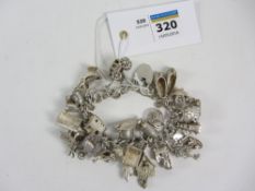 Hallmarked silver bracelet with charms Condition Report <a href='//www.