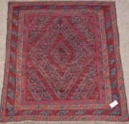 Tribal Gazak red and blue ground rug,