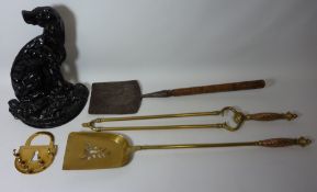 Cast iron doorstop in the form of seated dog, brass key holder, box of old keys, shovel,