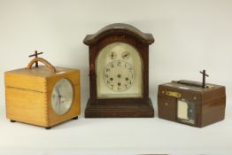 Two Benzing pigeon clocks and a 20th century oak cased clock,