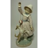 Lladro figure of a girl with a puppy Condition Report <a href='//www.