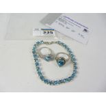 Blue topaz bracelet and two similar topaz rings all stamped 925 Condition Report
