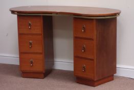 Mahogany finish kidney shaped kneehole dressing table, fitted with six drawers, W131cm, H76cm,