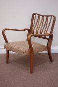 Moulded walnut faced plywood armchair,