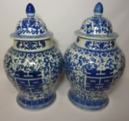 Pair oriental design blue and white covered vases H43cm Condition Report <a