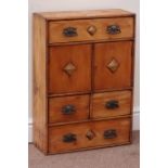 Pine two door cupboard fitted with two long and two short drawers, W46cm, H65cm,