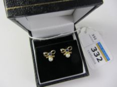 Pair of iolite and pearl gold-plated bow ear-rings Condition Report <a