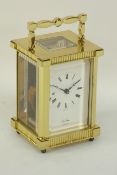 Brass and bevelled glass carriage clock, dial signed 'St.