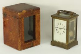 Early 20th century brass and glazed carriage clock, in case, H12.