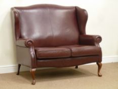 Sherborne two seat wing back sofa upholstered in burgundy leather,