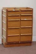 Oak finish haberdashery, jewellery, shops chest fitted with ten graduating drawers, W64cm, H90cm,