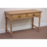 Edwardian stripped pine two drawer side table, W107cm, H69cm,