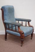 19th century walnut armchair raised on turned front legs,