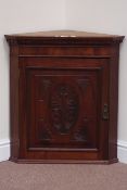 20th century mahogany wall hanging corner cupboard with carved panelled door, W66cm,