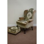20th century mahogany framed wide seat upholstered armchair raised on carved ball and claw feet,