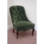 Victorian serpentine seat nursing chair upholstered in green buttoned fabric,