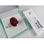 African ruby ring with white sapphires to the shoulders stamped 925 Condition Report