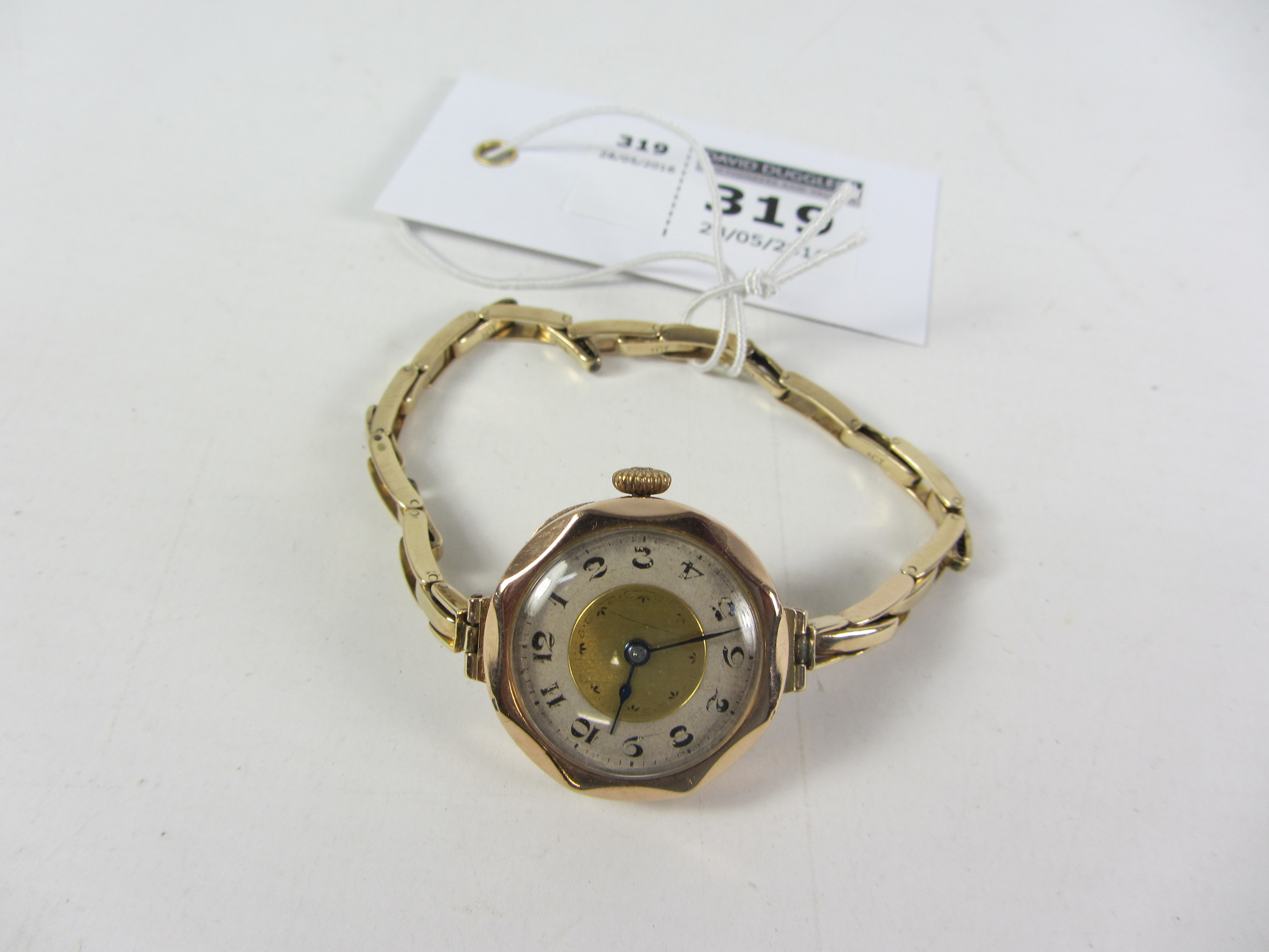 Lady's gold wrist watch hallmarked 9ct on expanding bracelet stamped 9ct (Recently serviced)