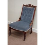 Edwardian walnut nursing chair upholstered in blue buttoned fabric,