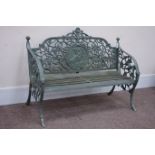 Victorian style heavy full cast iron garden bench, decorated with moulded birds and foliage,