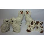 Pair Victorian Staffordshire spaniels H31cm and two other pairs of spaniels Condition
