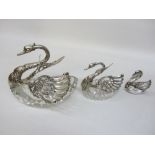 Three graduating German silver-mounted cut glass condiment dishes with hinged wings stamped silver