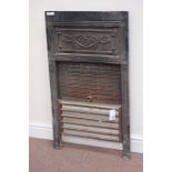 Cast iron fire inset lift up shutter and grate, decorative frieze panel above,