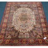 Persian Madras beige and red ground rug, overall floral design,