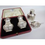 Pair of Edwardian silver peppers boxed,