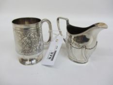 Small silver mug by Hilliard & Thomason Birmingham 1897 and a cream jug total approx 5oz