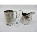 Small silver mug by Hilliard & Thomason Birmingham 1897 and a cream jug total approx 5oz