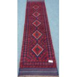 Meshwani red ground runner rug, geometric design,