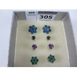 Pairs of ear-rings set with black diamonds, emeralds,