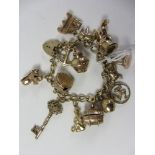 Gold bracelet fifteen charms all hallmarked 9ct approx 48.