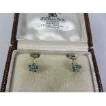 Pair of emerald and diamond flower set screw back ear-rings Condition Report <a