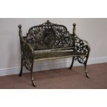 Victorian style heavy full cast iron garden bench, decorated with moulded birds and foliage,