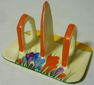 Bizarre by Clarice Cliff for Newport Pottery 'Crocus' pattern Conical shape toast rack L17cm