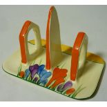 Bizarre by Clarice Cliff for Newport Pottery 'Crocus' pattern Conical shape toast rack L17cm