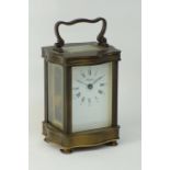 20th century brass and bevelled glass panelled carriage clock, dial signed 'Angelus',