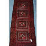 Persian Baluchi red ground rug, 190cm x 87cm Condition Report <a href='//www.