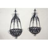 Pair of black finish metal hanging baskets,