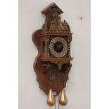 20th century Dutch figural wall clock, brass weight driven movement,