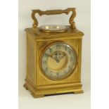 Early 20th century brass carriage clock, top fitted with curved thermometer and compass,
