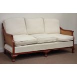 Reproduction mahogany three seat double caned bergère sofa (W186cm), and matching armchair (W70cm),