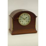 Edwardian mahogany mantel clock, brass column supports, W27cm,