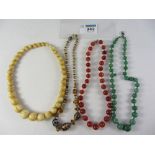 Early 20th century ivory bead necklace, cornelian,